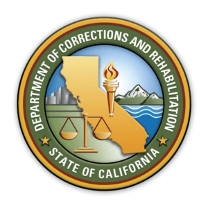 A picture of the department of corrections and rehabilitation seal.